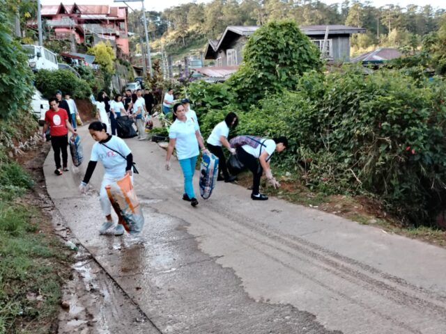 INC members lead Dengue prevention clean-up drive in Baguio